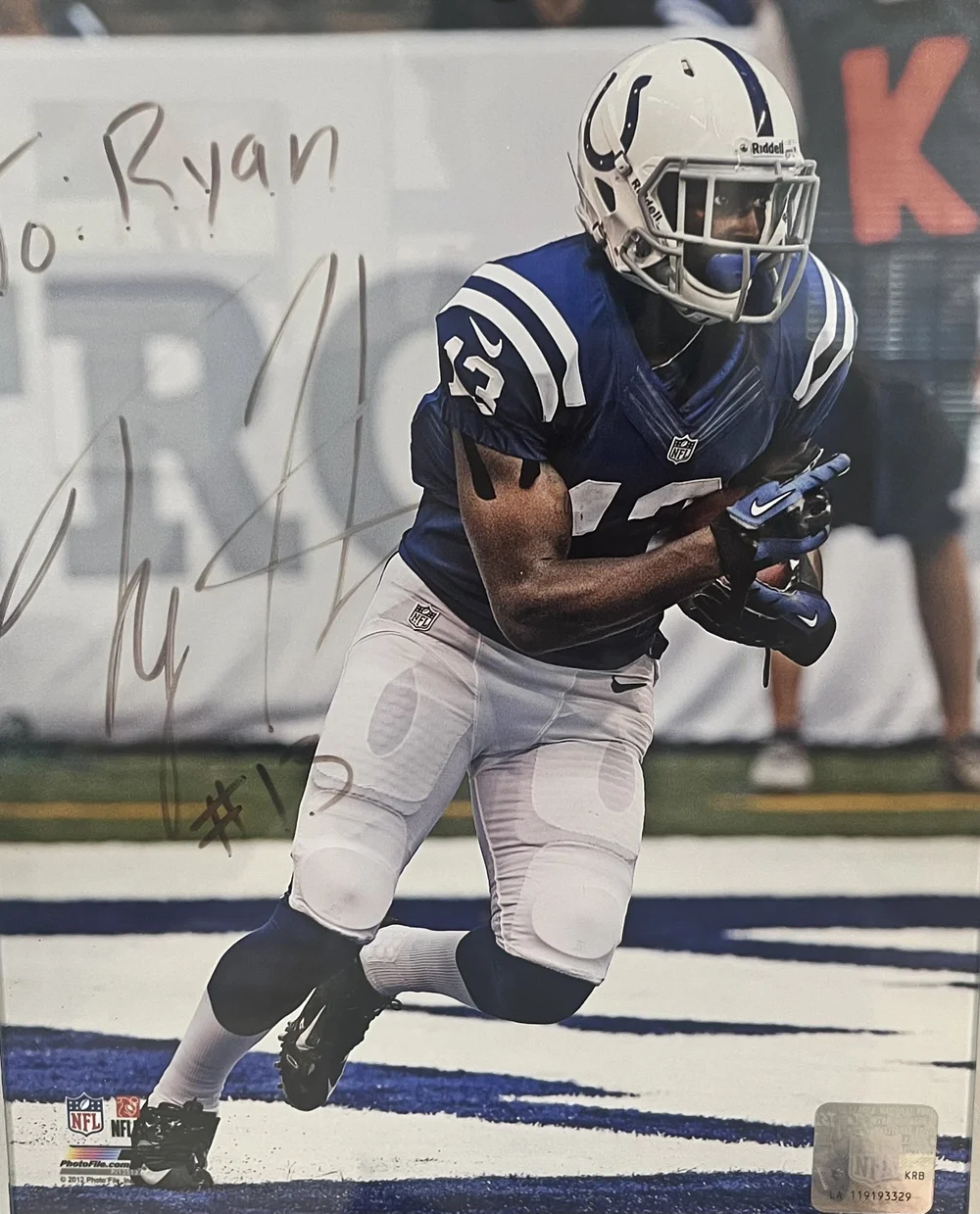 Signed photo from a professional athlete cared for at Indy Spine and Rehab